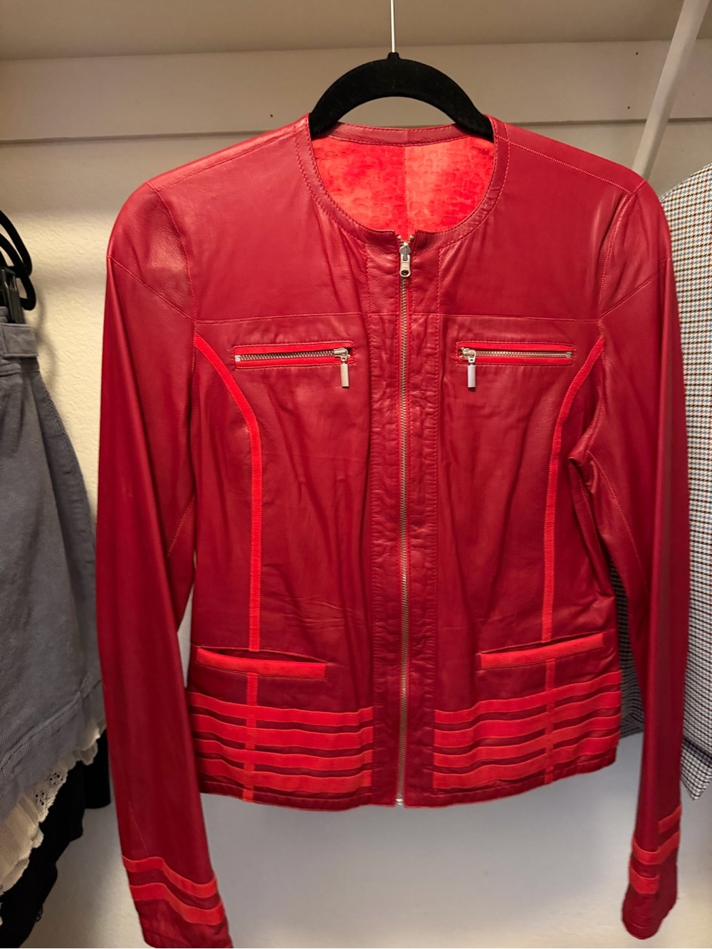 Beautiful red soft leather jacket with detail. High quality.size small or medium